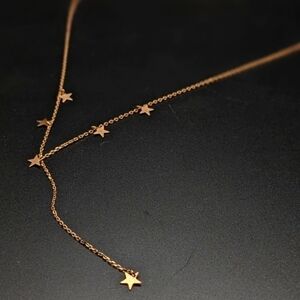 ROSE Gold toned Star Necklace with Dangle Charms